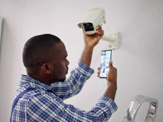 Man looking at CCTV cameras from his phone